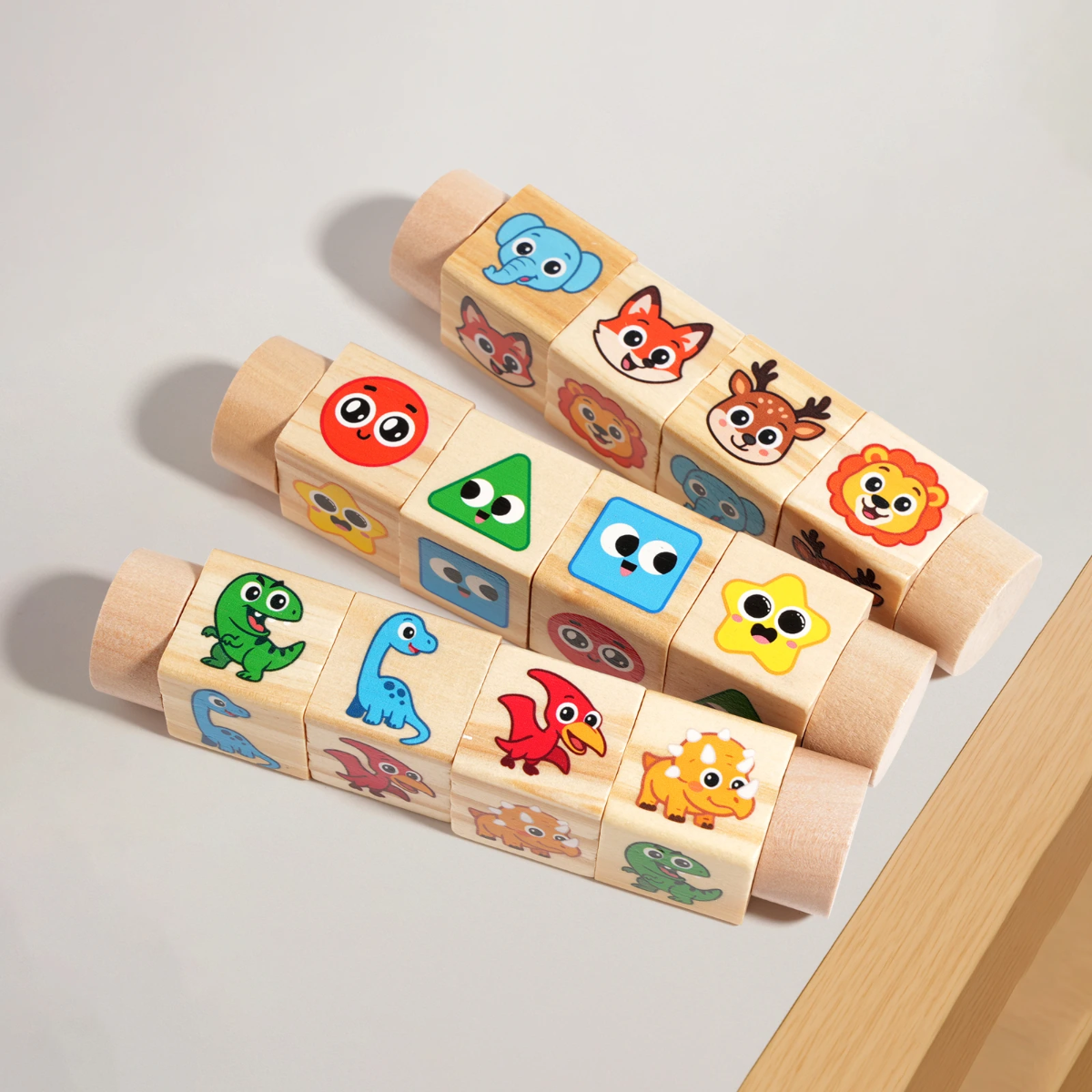 Wooden rotating puzzle blocks with cartoon illustrations for creative play