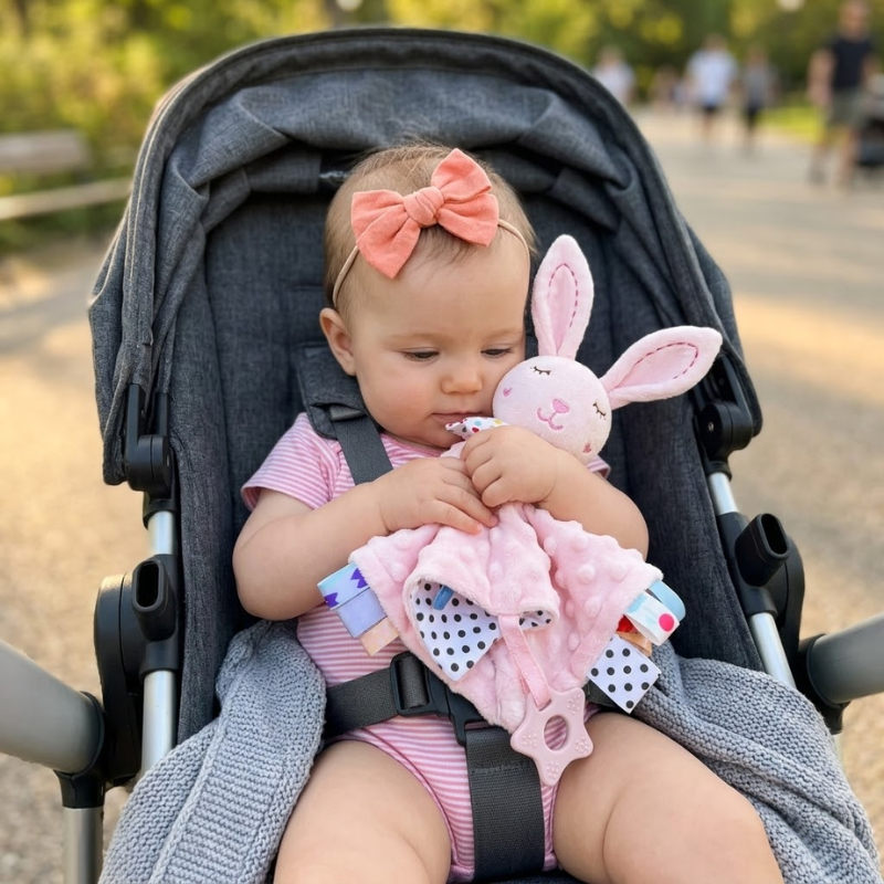 Plush baby security blanket comfort toy displayed from an angled view