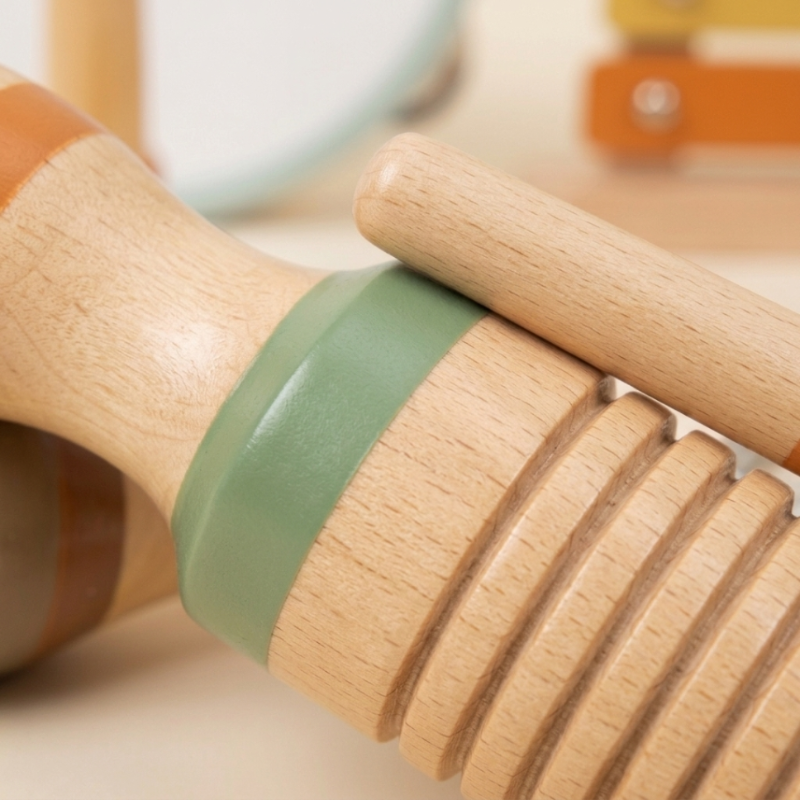 Wooden xylophone and percussion instruments arranged on a play table
