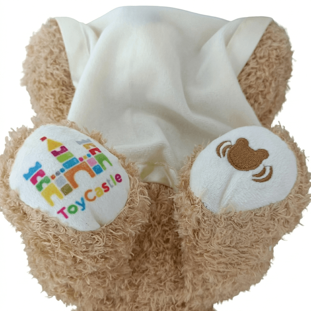 Soft plush bear toy for babies designed for musical soothing play